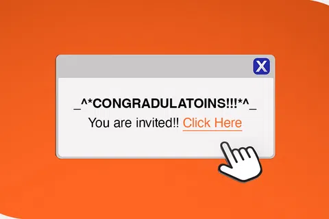 Popup message on orange background with congratulations and an invitation to click a link.