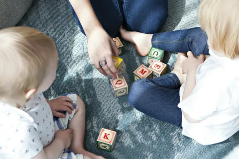 a group of people playing cards