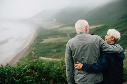 a man and woman embracing