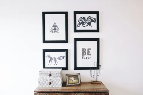 a wall with pictures on it