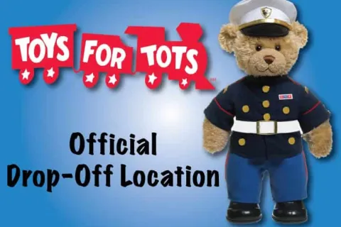 a teddy bear wearing a uniform