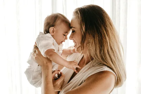 a person holding a baby