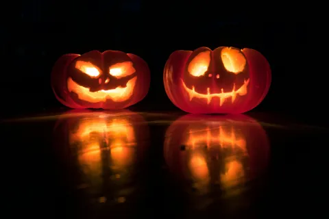 a group of carved pumpkins