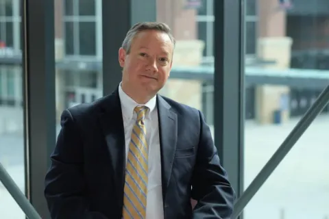 Marc Tarabella in a suit and tie