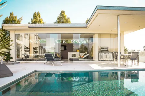 a swimming pool outside of a building