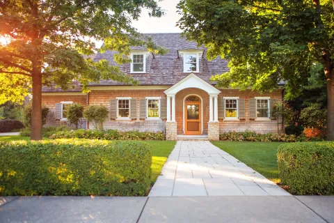 a brick house with a driveway