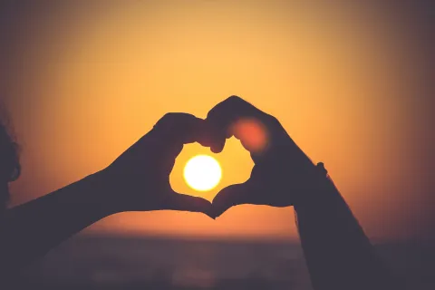 Hands making a heart to indicate love