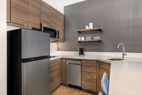Residence Inn by Marriott Custom Guest Kitchen Cabinetry and Quartz Countertops