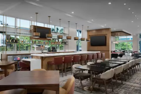 Homewood Suite and Tru by Hilton Custom Bar Area Millwork and Quartz Countertops, Including Focal Wall