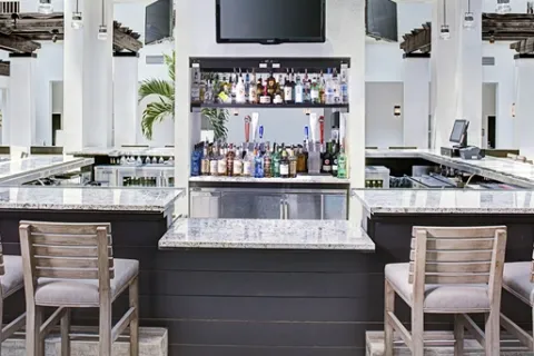 Embassy Suites by Hilton Destin, FL Custom Public Area Millwork and Countertops
