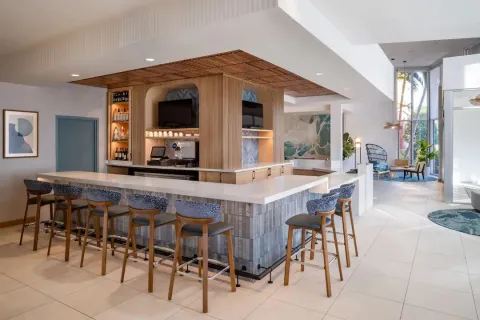 Hyatt Place Custom Bar Finishes, including Countertops, Wood Focal Wall, and Ceiling