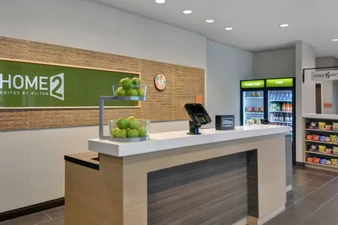 Home2 Suites by Hilton front desk millwork & countertops