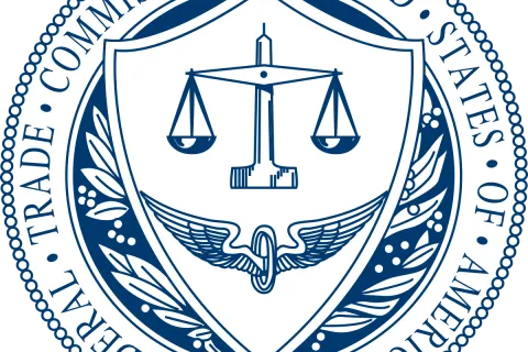 Seal of the United States Federal Trade Commission with scales of justice and caduceus symbol in blue.