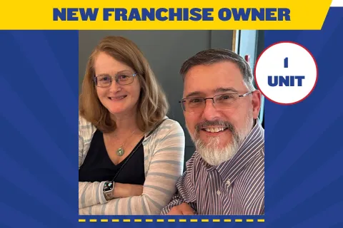 James and Angela Merchant, new franchise owners for USA Insulation in Reston, VA, smiling in a promotional image.