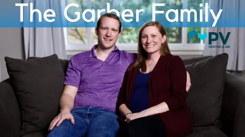 a man and woman sitting on a couch