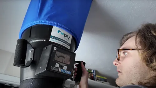 a person holding a camera
