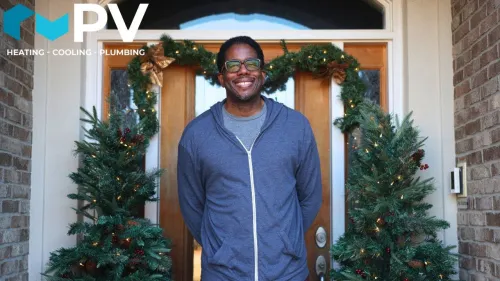 a man standing in front of a door with christmas trees