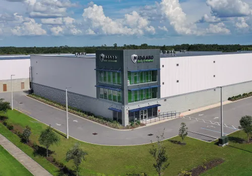 Modern self storage facility with Midgard signage.