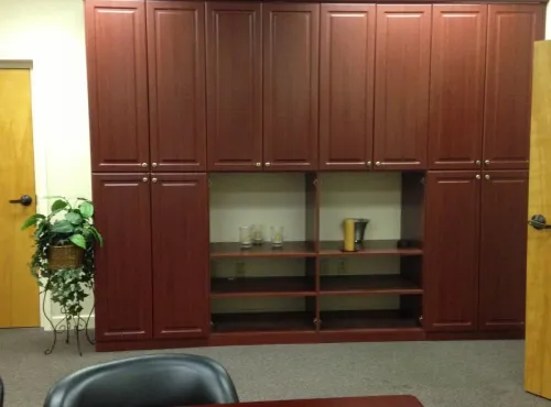 credenza behind desk