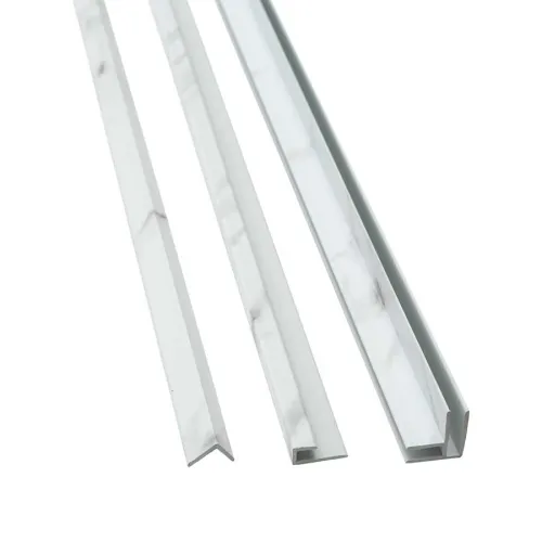 Three white marble-effect trim strips with different profile shapes on a white background