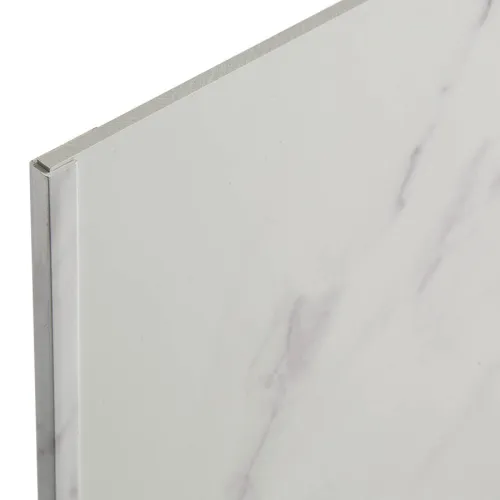 Close-up of a white marble laminate panel with a smooth surface and subtle gray veining.