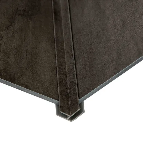 Close-up of dark brown tile edge with metal corner trim on white background