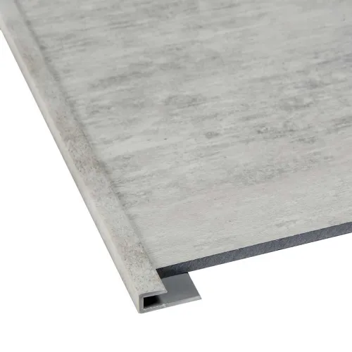 Close-up of a gray tile with a metal edge trim for flooring or wall protection.