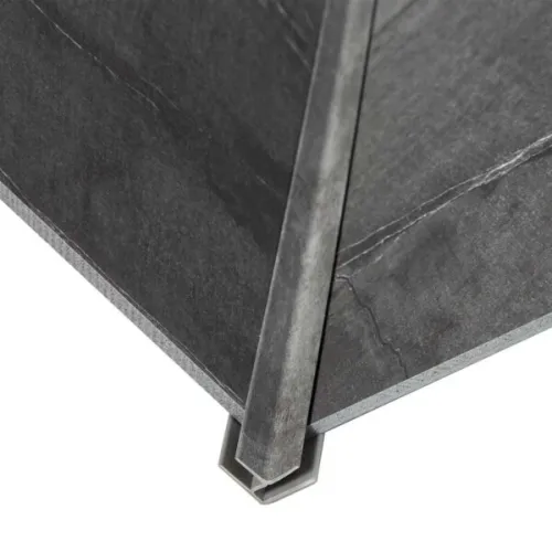 Close-up of dark gray metal corner joint with visible weld marks and textured surface isolated on white background.