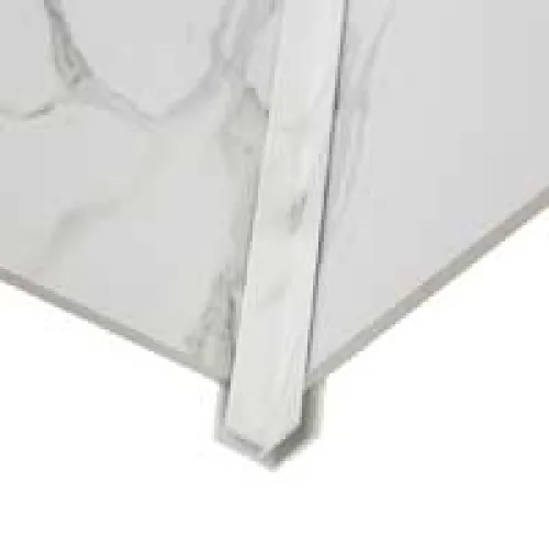 Close-up of white marble tiles with gray veining laid at a corner edge with a narrow marble strip.