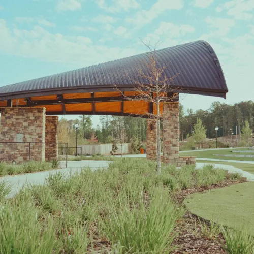 a building with a grass field