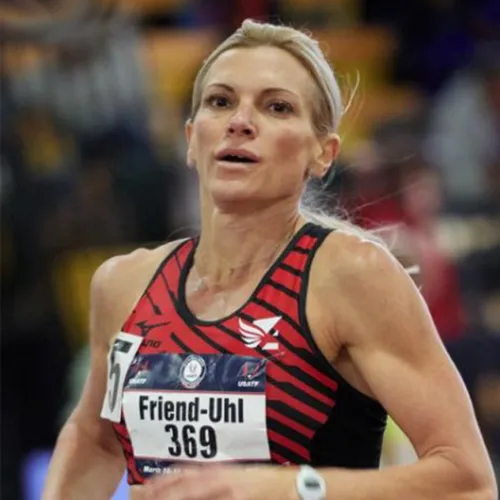 a woman standing in front of a crowd
