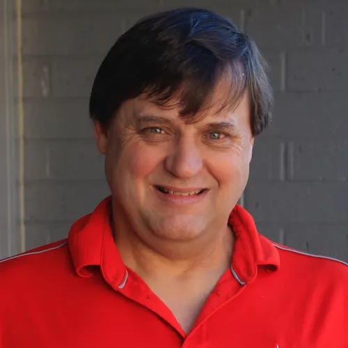 a person smiling for the camera