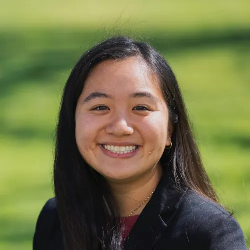 a woman smiling at the camera