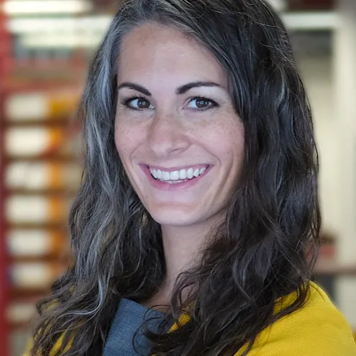 a woman smiling for the camera