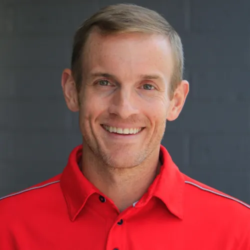 a man smiling for the camera