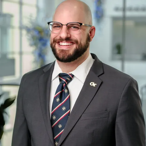 a man wearing a suit and tie