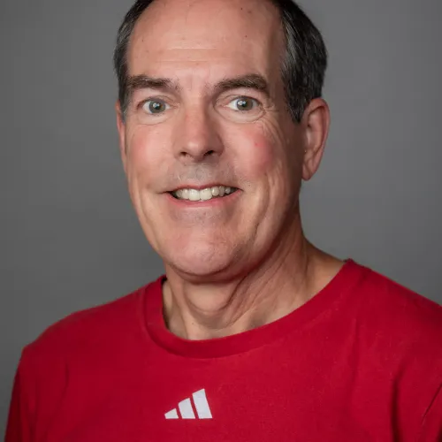 a man wearing a red shirt