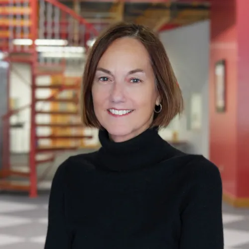 a woman smiling in a store