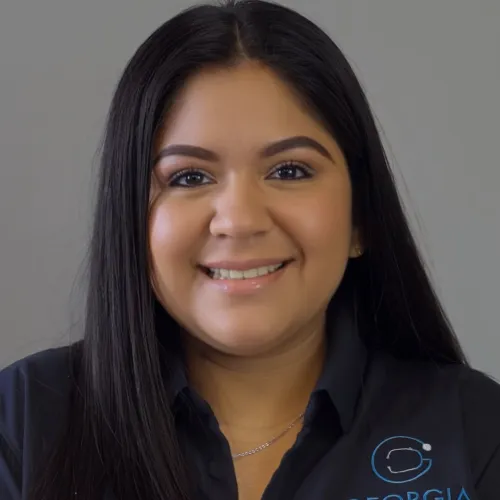a woman smiling for the camera