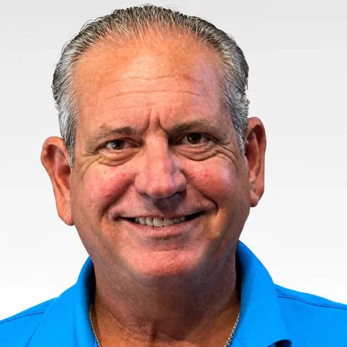 friendly_gray_haired_man_headshot.jpg