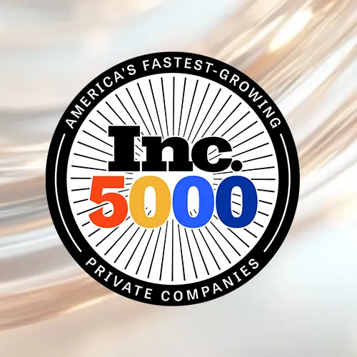 Inc. 5000 badge for America's fastest-growing private companies with vibrant orange, yellow, and blue numbers.