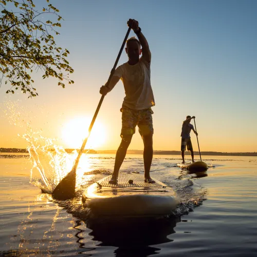 a man on a paddle board