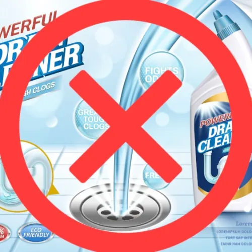Powerful drain cleaner bottle with liquid flowing into drain and red prohibition symbol over it