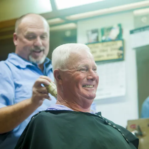 Man in barber shop getting a haircut