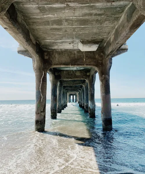 a stone archway over water