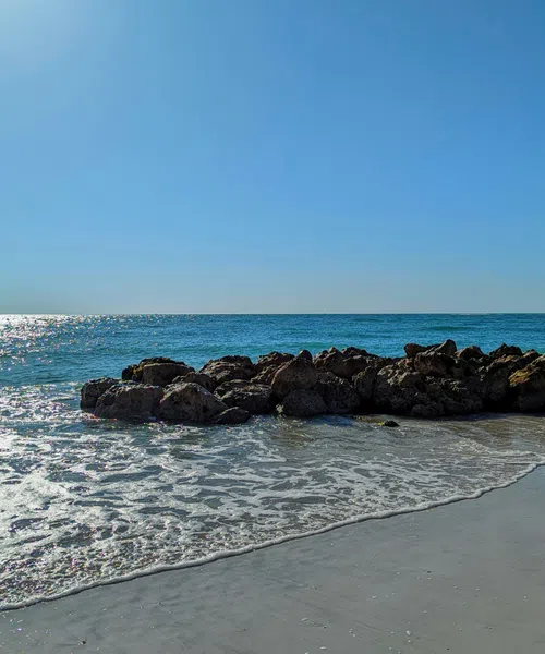 sandy shoreline of Longboat Key representing we have HVAC in your area