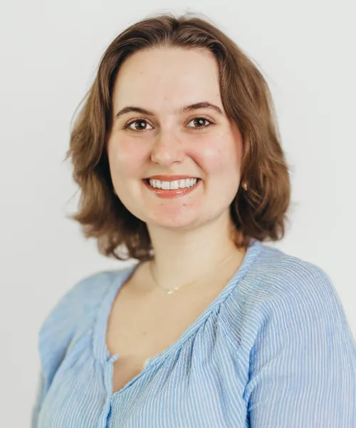 a woman smiling for the camera