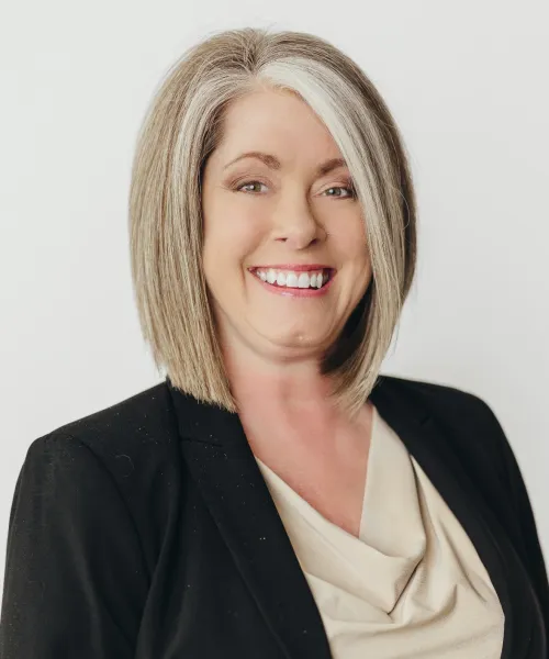 a woman smiling for the camera
