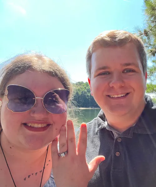 a man and woman taking a selfie