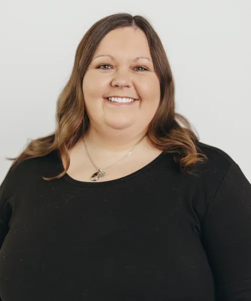 a woman smiling for the camera